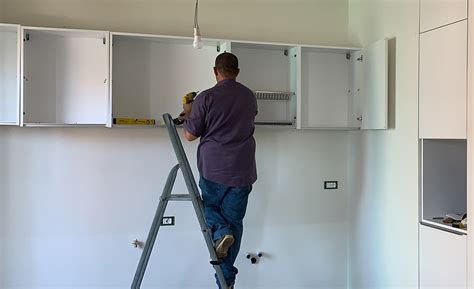 how to mount kitchen cabinets on steel studs|attaching cabinets to steel studs.